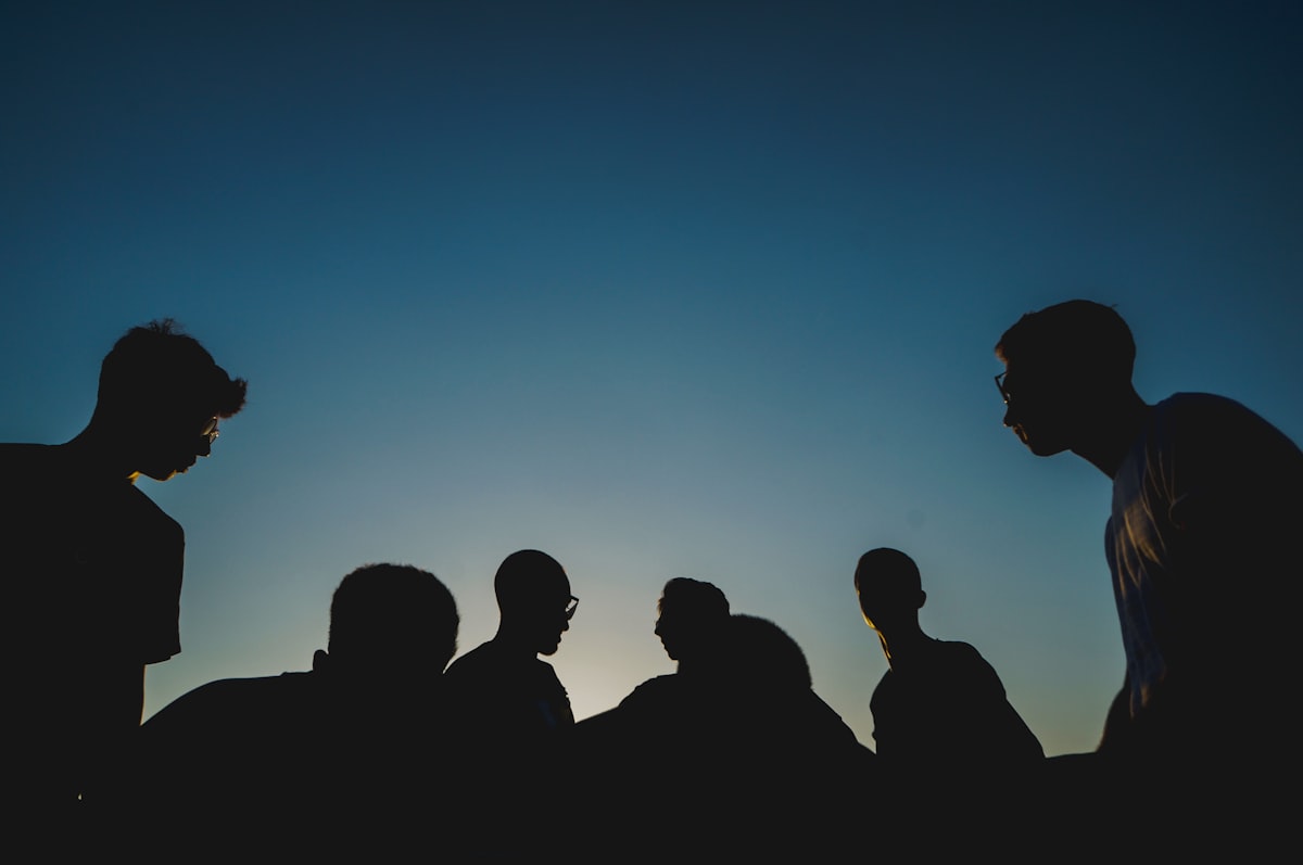 Men discussing wellness and mental health